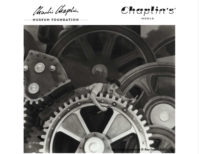 Image showing Chaplin on a big industrial gear.